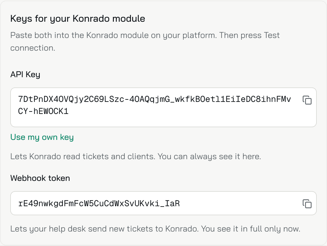 The Keys for your Konrado module box: the API Key with its copy button and Use my own key, and the Webhook token with its copy button