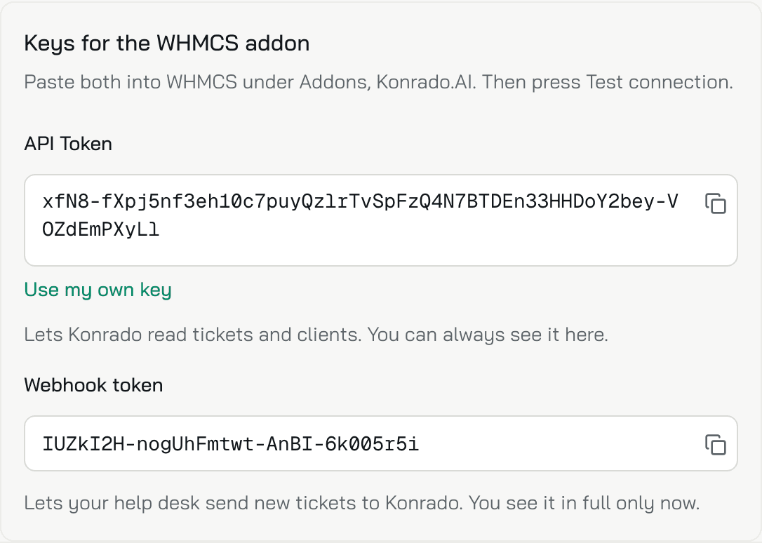 The Keys for the WHMCS addon box: the API Token and the Webhook token, each with its copy button